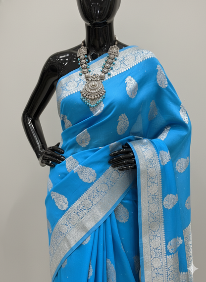 Captivating Sky Blue Silk Saree with Silver Zari and Magenta Blouse