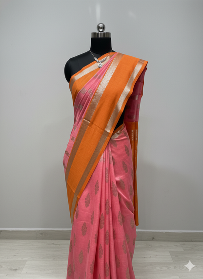 Charming Peach-Pink Saree with Vibrant Orange Contrast and Gold Zari