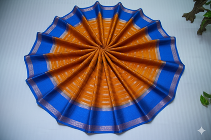 Vibrant Rust Orange Silk Saree with Bold Royal Blue Border