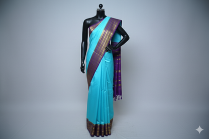 Vibrant Aqua Blue Silk Saree with Bold Purple Contrast Border